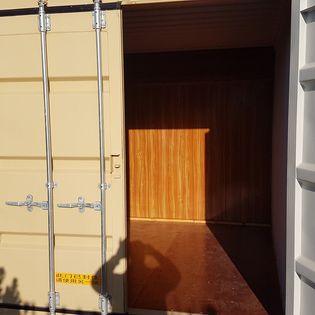 Half container storage unit with doors open